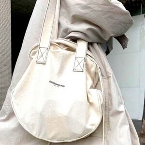 ORSEUND IRIS ICONIC CANVAS CIRCLE TOTE